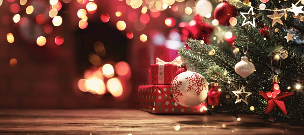Christmas tree near a fireplace